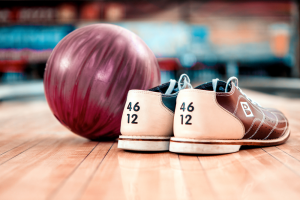 bowling alley with bowling ball and bowling shoes